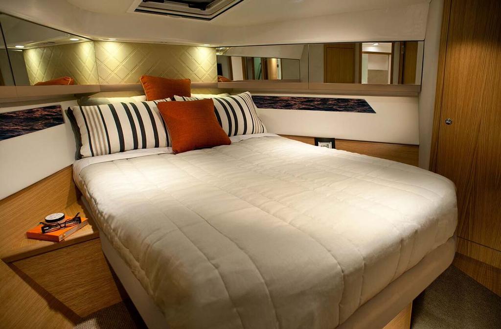 The master stateroom features a queen-sized island bed and en suite bathroom © Riviera Australia